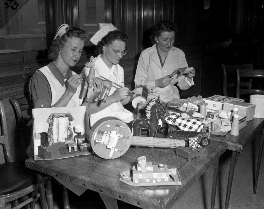 Original 4x5 Negative of nurses making scrap toys  