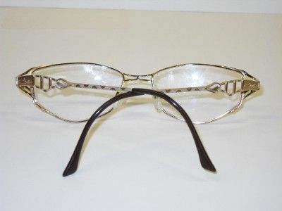 Eyeglasses from Cazal. A fun print on the gold frames. Small 