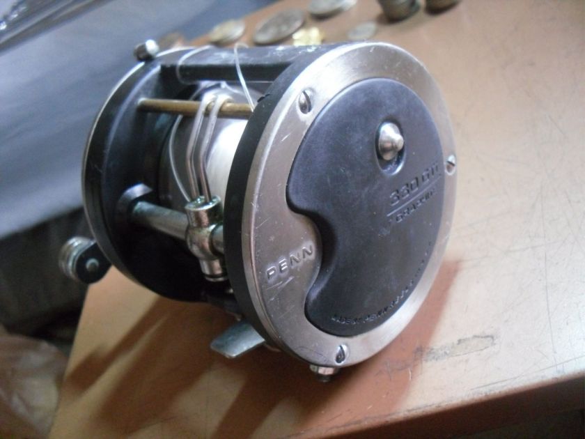 PENN 330I HIGH SPEED GRAPHITE SALTWATER BAITCASTER REEL GOOD USED 