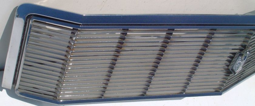 This is an original grill and center emblem for a 1971 Monte Carlo.